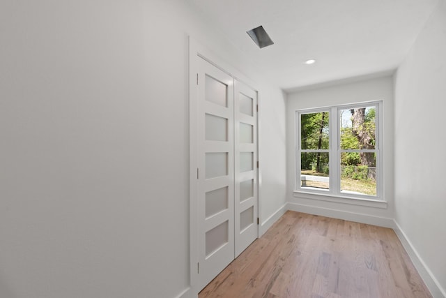 9805 Bluff Dale Dr, Dallas, TX 75218 - interior space with light wood finished floors and baseboards