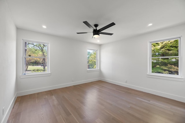 9805 Bluff Dale Dr, Dallas, TX 75218 - spare room with a wealth of natural light, recessed lighting, wood finished floors, and baseboards