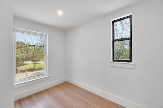 9805 Bluff Dale Dr, Dallas, TX 75218 - empty room with baseboards and light wood-type flooring