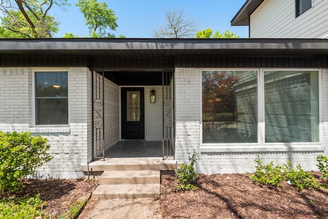9805 Bluff Dale Dr, Dallas, TX 75218 - view of exterior entry with brick siding