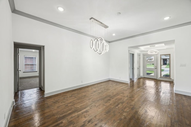 4108 Desert Garden Dr, Plano, TX 75093 - unfurnished dining area with a chandelier, dark wood-style flooring, crown molding, baseboards, and recessed lighting