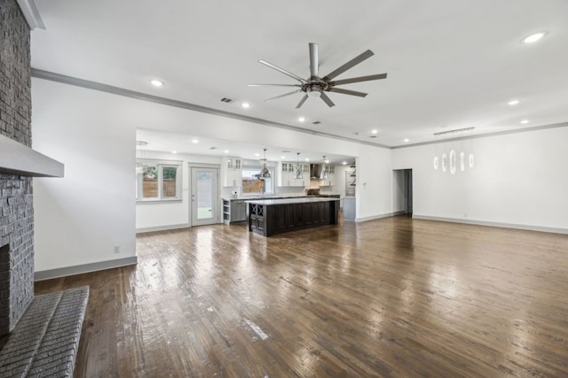 4108 Desert Garden Dr, Plano, TX 75093 - unfurnished living room featuring a fireplace, ceiling fan, dark wood-style flooring, recessed lighting, and baseboards