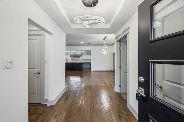 4108 Desert Garden Dr, Plano, TX 75093 - entrance foyer featuring a chandelier, dark wood finished floors, baseboards, and a raised ceiling