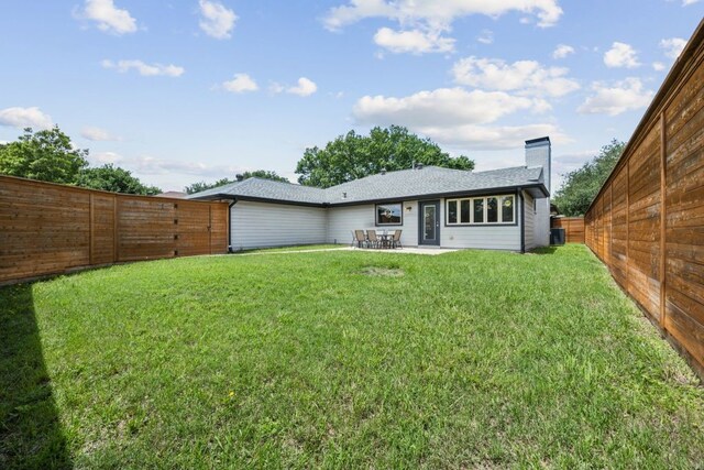 4108 Desert Garden Dr, Plano, TX 75093 - rear view of property with a chimney and a patio area