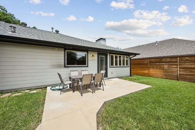 4108 Desert Garden Dr, Plano, TX 75093 - back of property featuring a patio, a chimney, and a shingled roof
