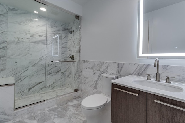 3130 N Harwood St Unit 1404, Dallas, TX 75201 - full bathroom with toilet, vanity, a marble finish shower, tile walls, and marble look tiles