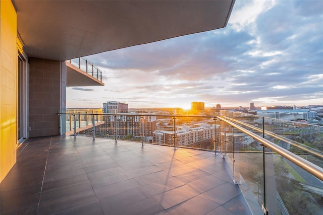 3130 N Harwood St Unit 1404, Dallas, TX 75201 - balcony at dusk with a view of city