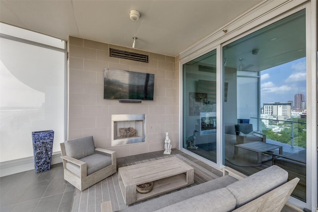 3130 N Harwood St Unit 1404, Dallas, TX 75201 - view of patio with a fireplace