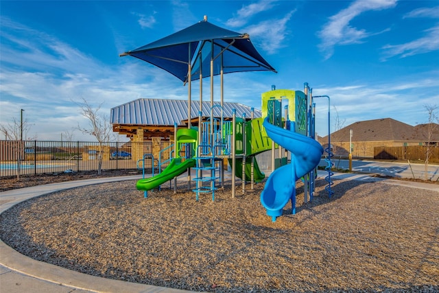 community play area featuring fence