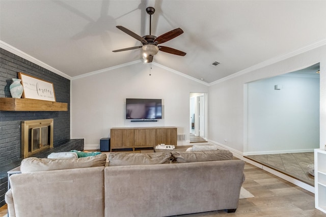 5805 Trail Crest Dr, Arlington, TX 76017 - living room featuring wood finished floors, a brick fireplace, ceiling fan, and lofted ceiling