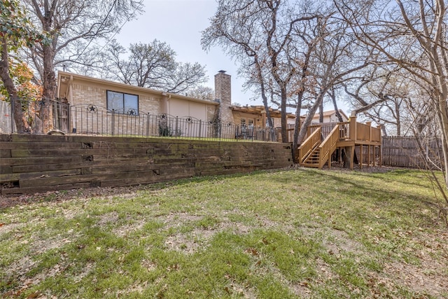 5805 Trail Crest Dr, Arlington, TX 76017 - back of house with a fenced backyard, a chimney, a wooden deck, and stairway