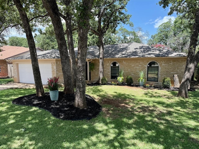 5805 Trail Crest Dr, Arlington, TX 76017 - view of front of house with brick siding, a front lawn, and an attached garage