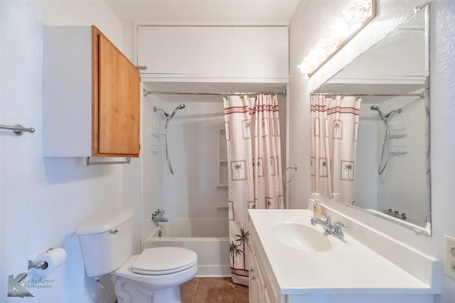 bathroom with tile patterned flooring, toilet, vanity, and shower / bath combo with shower curtain