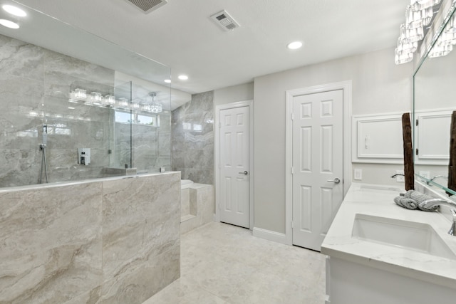 1105 Northpark Dr, Richardson, TX 75081 - bathroom with recessed lighting, walk in shower, double vanity, tile patterned flooring, and baseboards