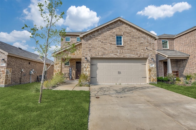 528 Lake Erie Dr, Princeton, TX 75407 - view of front of house featuring a front lawn, brick siding, and concrete driveway