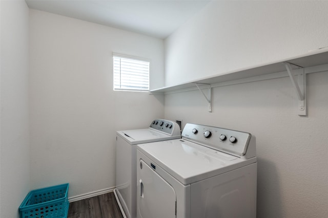 528 Lake Erie Dr, Princeton, TX 75407 - laundry room with independent washer and dryer, laundry area, dark wood-type flooring, and baseboards
