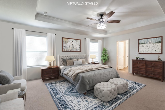 528 Lake Erie Dr, Princeton, TX 75407 - bedroom featuring a ceiling fan, ornamental molding, a tray ceiling, and carpet