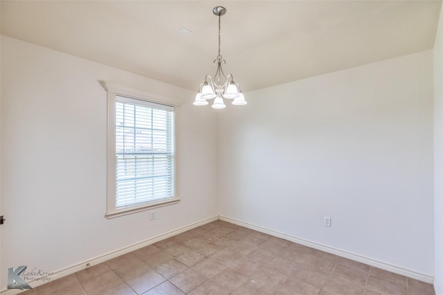 358 Sugarberry Ave, Abilene, TX 79602 - unfurnished room with a chandelier and baseboards