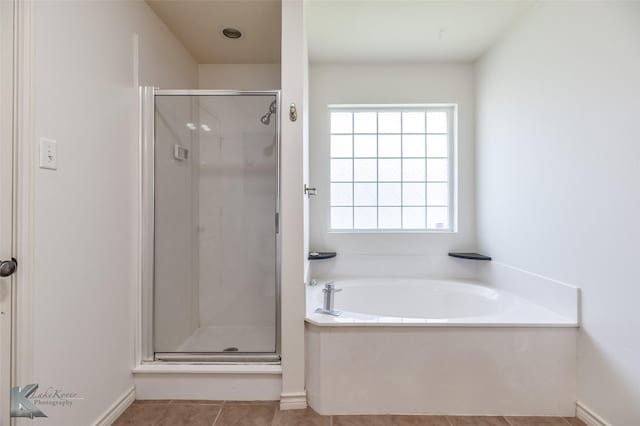 358 Sugarberry Ave, Abilene, TX 79602 - full bathroom with a bath, a stall shower, and tile patterned floors