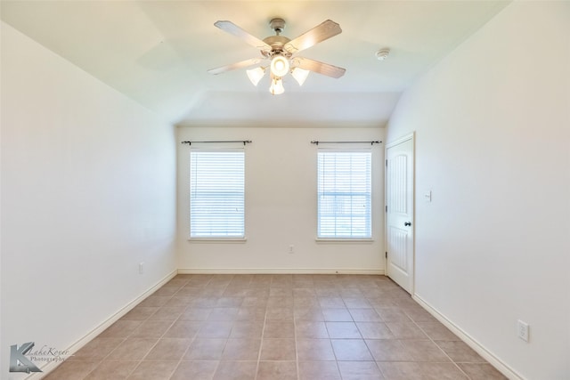 358 Sugarberry Ave, Abilene, TX 79602 - unfurnished room featuring a smoke detector, vaulted ceiling, light tile patterned flooring, a ceiling fan, and baseboards
