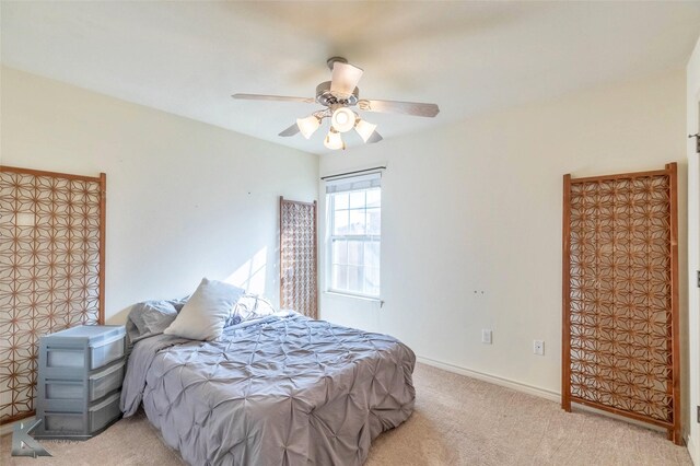358 Sugarberry Ave, Abilene, TX 79602 - bedroom with ceiling fan, baseboards, and carpet floors
