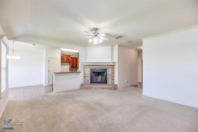 358 Sugarberry Ave, Abilene, TX 79602 - unfurnished living room featuring light carpet, ceiling fan, baseboards, and a fireplace