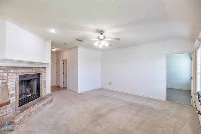 358 Sugarberry Ave, Abilene, TX 79602 - unfurnished living room featuring light colored carpet, ceiling fan, a fireplace, baseboards, and crown molding