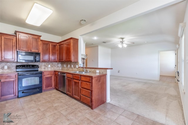 358 Sugarberry Ave, Abilene, TX 79602 - kitchen with black appliances, a sink, a peninsula, ceiling fan, and backsplash