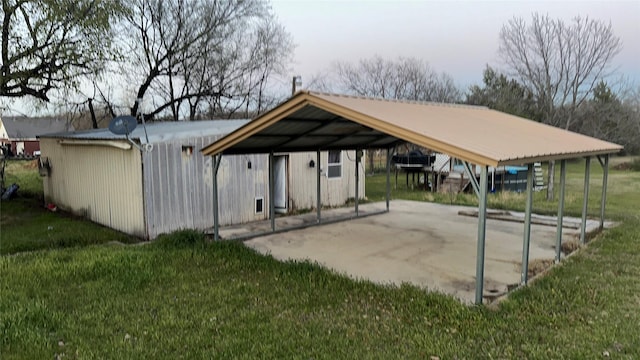 exterior space with a carport