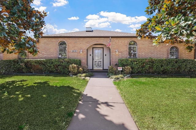 2616 Appledale Ln, Dallas, TX 75287 - view of front of property featuring brick siding and a front lawn
