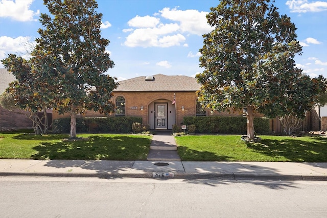 2616 Appledale Ln, Dallas, TX 75287 - view of front of property featuring a front yard and brick siding
