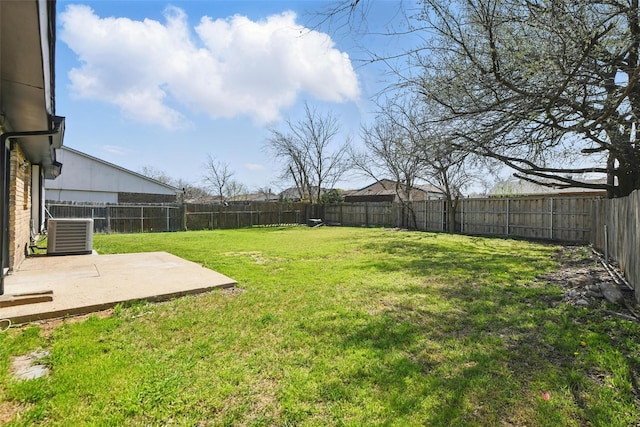 view of yard featuring a fenced backyard, cooling unit, and a patio