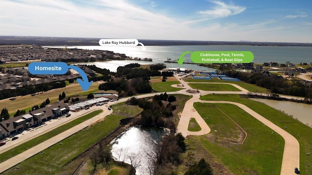 birds eye view of property featuring a water view