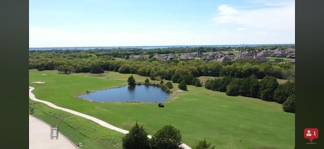 bird's eye view with a residential view and a water view