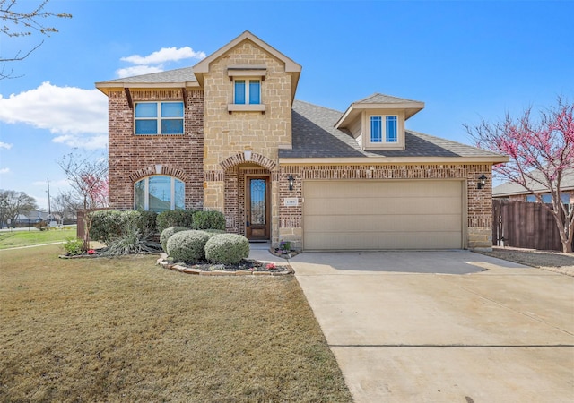 1305 Greenrock Ct, Midlothian, TX 76065 - view of front of home featuring brick siding, an attached garage, a shingled roof, and concrete driveway