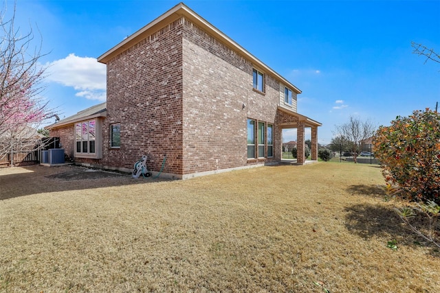1305 Greenrock Ct, Midlothian, TX 76065 - rear view of property with brick siding and cooling unit
