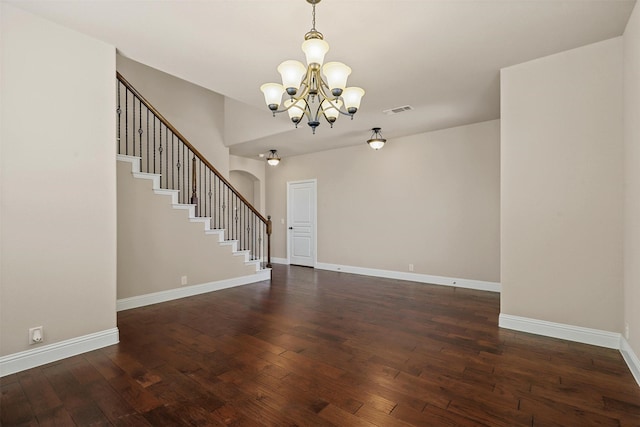 1305 Greenrock Ct, Midlothian, TX 76065 - foyer featuring a chandelier, arched walkways, stairs, and dark wood-style floors