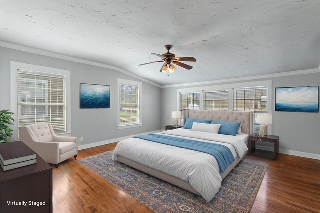 2508 Carnation Ave, Fort Worth, TX 76111 - bedroom with baseboards, vaulted ceiling, wood finished floors, ornamental molding, and ceiling fan