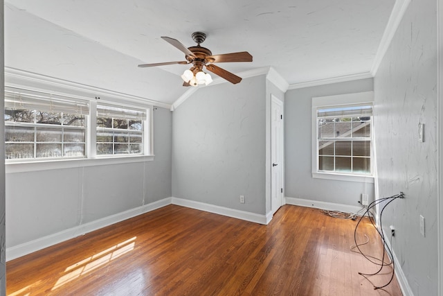 2508 Carnation Ave, Fort Worth, TX 76111 - unfurnished room featuring wood finished floors, ornamental molding, a ceiling fan, vaulted ceiling, and baseboards
