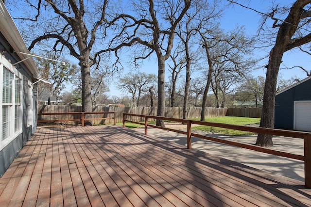 2508 Carnation Ave, Fort Worth, TX 76111 - wooden deck with a fenced backyard and an outbuilding