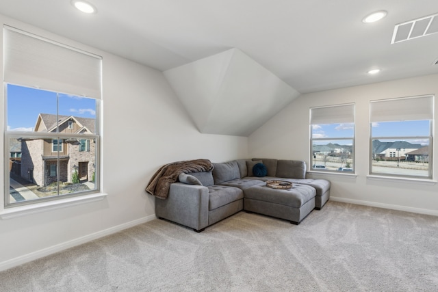 sitting room with carpet flooring, recessed lighting, baseboards, and visible vents