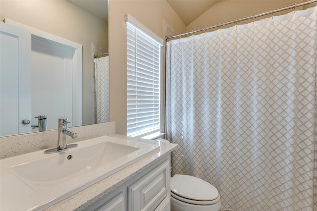 2624 El Camino Ln, Dallas, TX 75212 - bathroom with vanity, toilet, and a shower with shower curtain