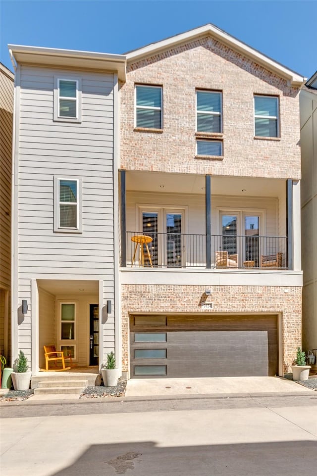 2624 El Camino Ln, Dallas, TX 75212 - view of front of home featuring an attached garage and driveway
