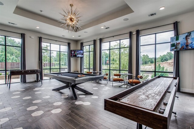 2624 El Camino Ln, Dallas, TX 75212 - game room with a raised ceiling, pool table, recessed lighting, wood finished floors, and a chandelier