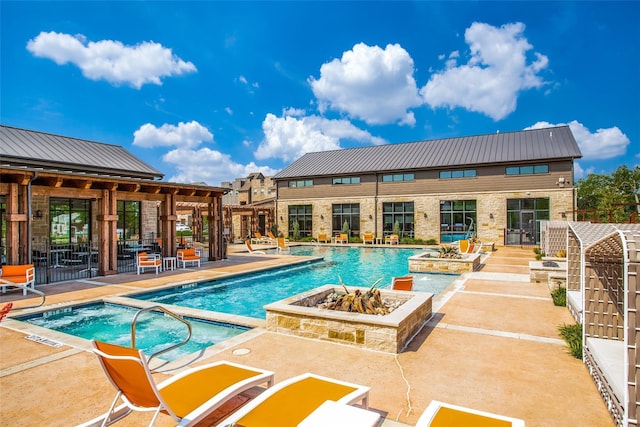 2624 El Camino Ln, Dallas, TX 75212 - community pool featuring a patio, a hot tub, an outdoor fire pit, and fence