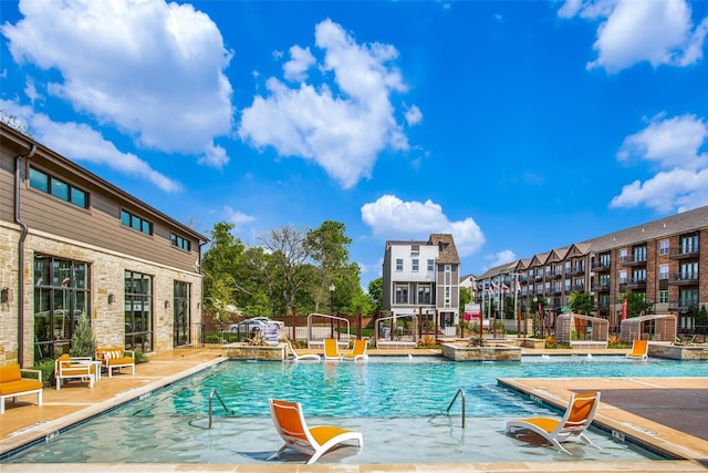 2624 El Camino Ln, Dallas, TX 75212 - community pool featuring a patio area and fence