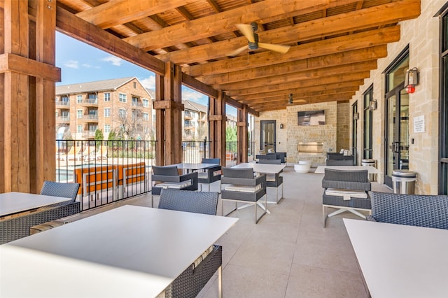 2624 El Camino Ln, Dallas, TX 75212 - view of patio with an outdoor living space with a fireplace and a ceiling fan