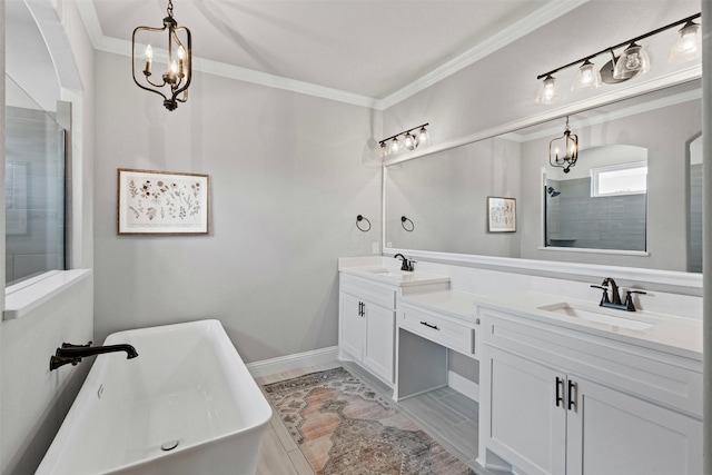 305 Scenic Creek Ct, Reno, TX 76020 - full bath with a chandelier, double vanity, a soaking tub, crown molding, and a tile shower