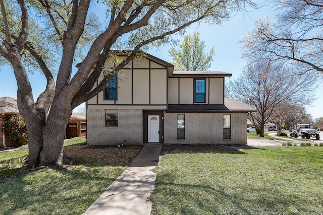 702 Middle Glen Dr, Garland, TX 75043 - view of front of home featuring a front lawn and brick siding