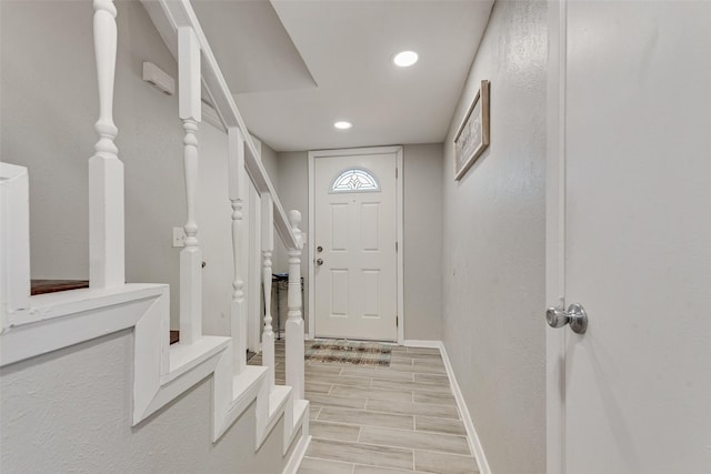 702 Middle Glen Dr, Garland, TX 75043 - mudroom featuring baseboards, recessed lighting, and wood finish floors